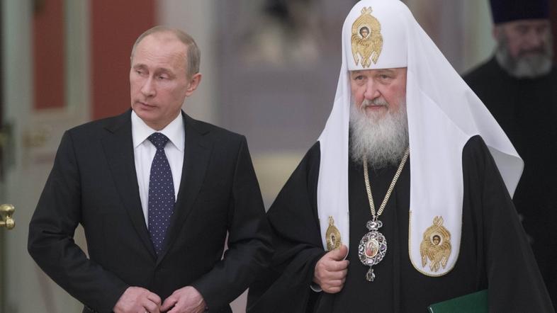 razno 10.04.13. Russia's President Vladimir Putin (L) and Patriarch of Moscow an