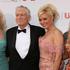 Na fotografiji so Holly Madison, Hugh Hefner, Kendra Wilkinson in Bridget Marqua