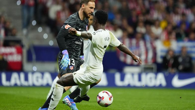 Jan Oblak in Vinicius Junior