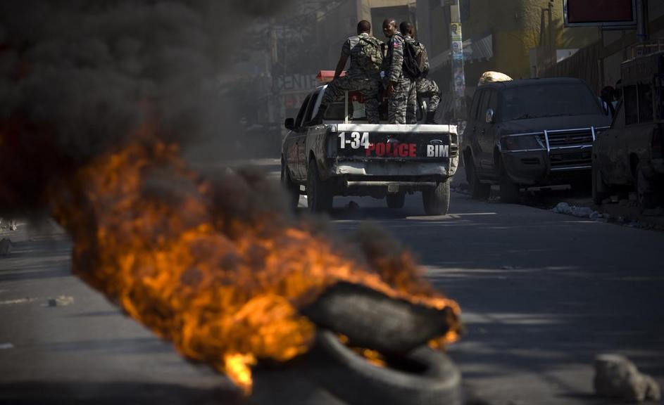 kolera, haiti, protesti, združeni narodi, neredi, ulica