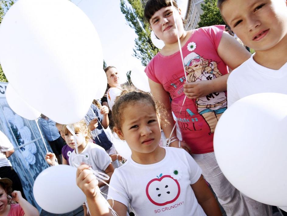 Prešernov trg: minuta molka in spust belih balonov sta simbolno prikazala izgino