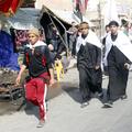 Romarji na poti skozi Bagdad v Karbalo. (Foto: Reuters)